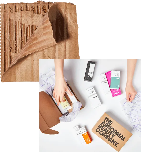 Image of carboard and Deciem products being packed